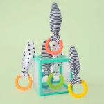 Sassy manipulacyjna kostka sensoryczna sorter z krążkami