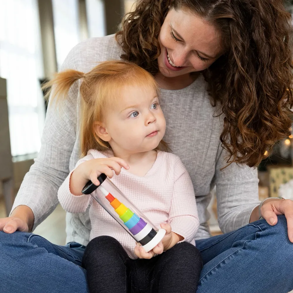 Fat Brain Toys Flipty to zabawka sensoryczna dla dzieci od 12. miesiąca życia, która łączy ruch, dźwięk i zmieniające się wzory.