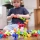 Fat Brain Toys Squigz Starter Set 3+ – silikonowe klocki przyssawki 22 el., zabawka konstrukcyjna dla dzieci, prezent na urodziny lub święta, rozwój motoryki małej, kreatywności i wyobraźni przestrzennej przez budowanie bez ograniczeń