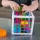 Fat Brain Toys - elastyczna kostka i sorter InnyBin zabawka dla rocznego dziecka - prezent na roczek