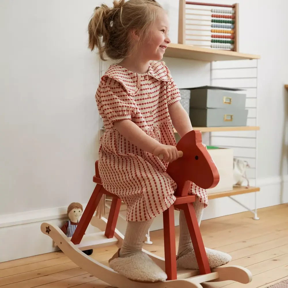 Kids Concept konik drewniany na biegunach klasyczny orange red