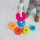 Prezent dla dziecka 1 rok SpinAgain Fat Brain Toys – sensoryczna wieża z wirującymi krążkami, zabawka edukacyjna na roczek, trening chwytu, koncentracji i myślenia przyczynowo skutkowego