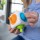 Fat Brain Toys Tugl Cube kostka manipulacyjna sensoryczna silikonowa zabawka fidget toy dla malucha F305. Kostka sensoryczna z wciskanymi silikonowymi elementami do ćwiczenia małej motoryki dla dzieci od 2 lat 2+ / do podróży.