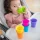 Fat Brain Toys Suction Kupz 12m+ – silikonowe kubeczki z przyssawką dla dziecka 1+, zabawka sensoryczna do układania i kąpieli, prezent na roczek, rozwój motoryki małej, koordynacji ręka-oko i zabawy bez bałaganu