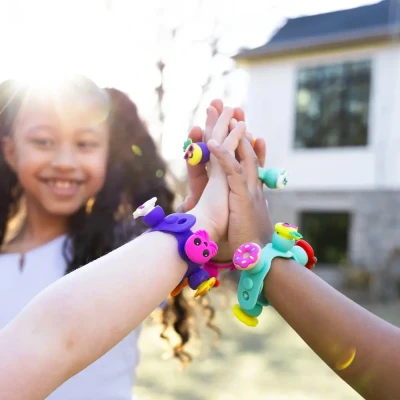 Fat Brain Toy zestaw do robienia bransoletek dla dziewczynki Plip Charms fiolet