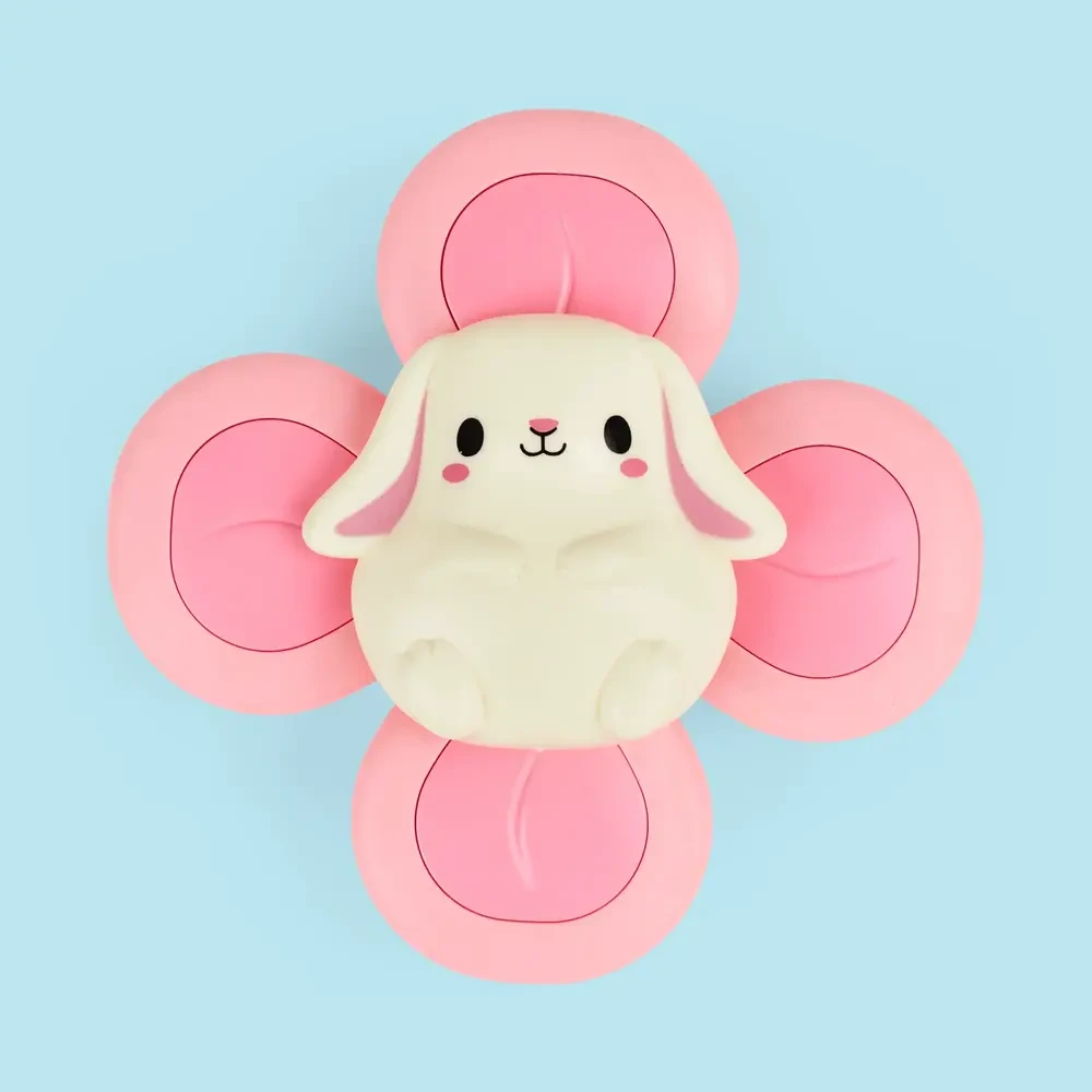 Sensoryczny spinner z przyssawką Tiger Tribe Bunny dla niemowląt (6m+). Wirująca zabawka z króliczkiem do kąpieli, krzesełka do karmienia i podróży. Bezpieczny, kolorowy gadżet bez BPA wspierający motorykę i skupienie dziecka.