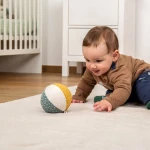Piłka Sensoryczna z Grzechotką do Wózka Pluszowa Miękka 11 cm sigikid 3m+