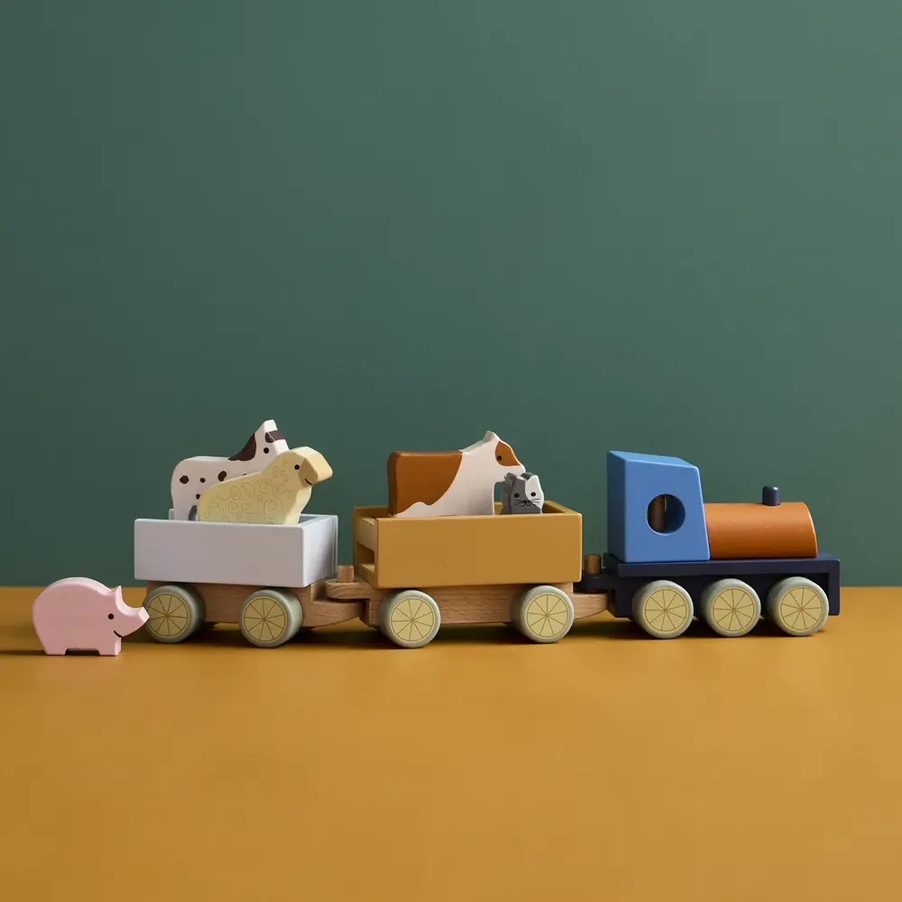Drewniany pociąg do ciągnięcia ze zwierzątkami Kid’s Concept Farma – zabawka edukacyjna dla rocznego dziecka wspierająca naukę chodzenia.